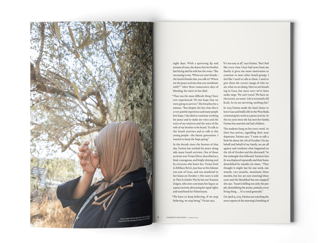 A woman wearing a beige hijab sits outdoors beside a tree, covering part of her face with her hand. The image is on the left page of an open magazine, with text filling the right page.